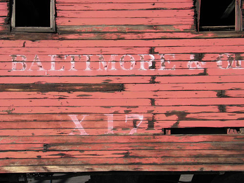 On the side of a decaying caboose.