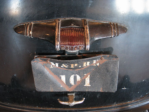 This was an ancient Buick converted to a railcar for examining the tracks.