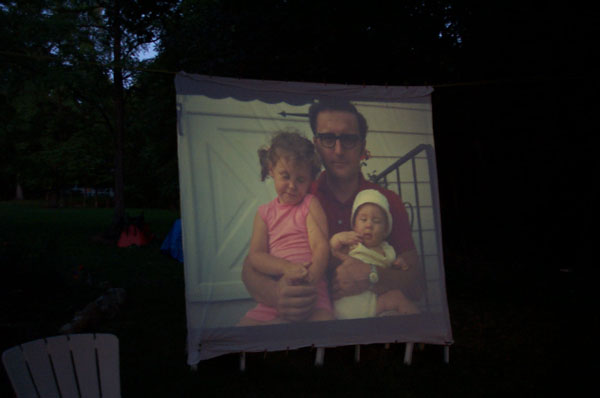 My Dad stretched a sheet over the clothesline and showed carousel after carousel of family pictures.