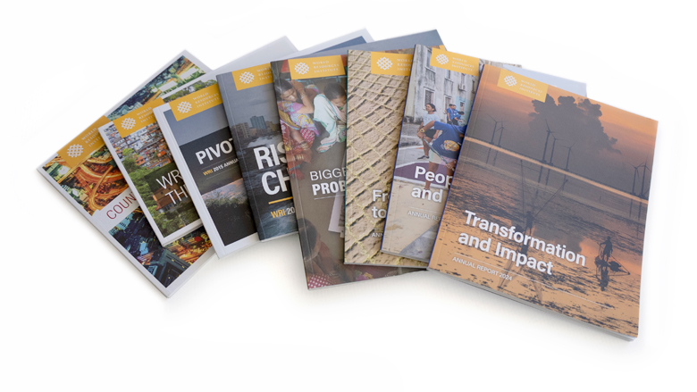 A spread of WRI's Annual Reports from 2014-2024.